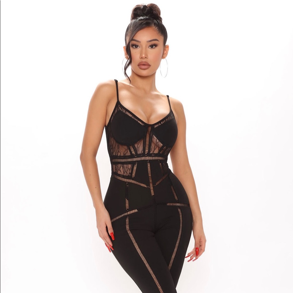Hollywood hills black jumpsuit. The stretch is MINIMAL.